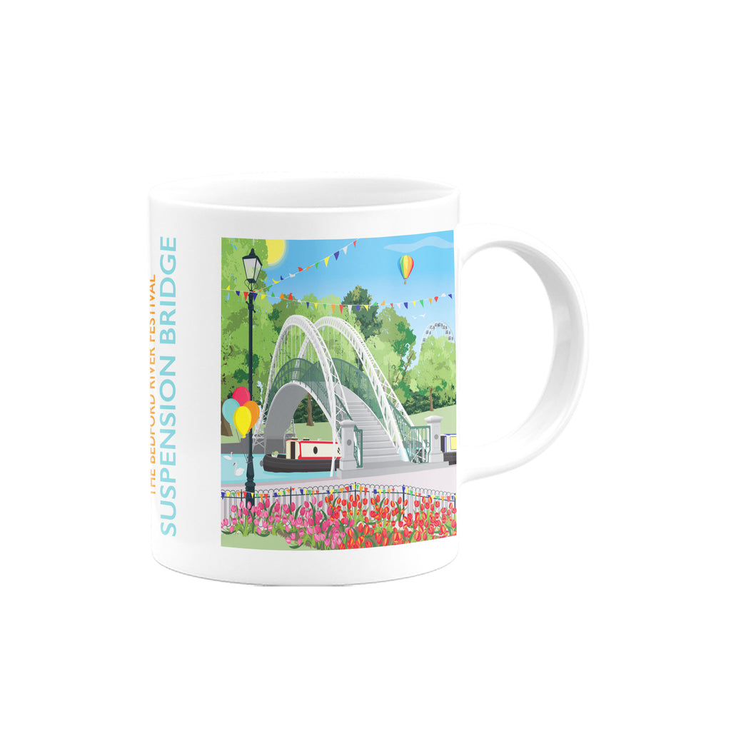 a white coffee mug with a picture of a bridge